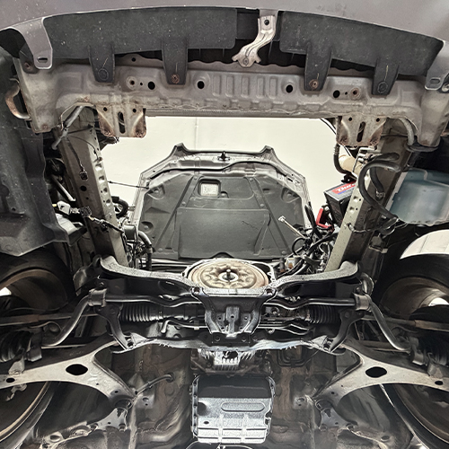 View under the hood of a vehicle getting engine work completed at the Barcroft auto repair shop