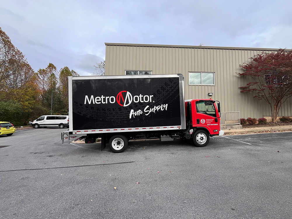 Metro Motor Auto Supply delivery truck parked outside of warehouse