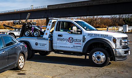 D.C. tow truck arrives for roadside assistance.