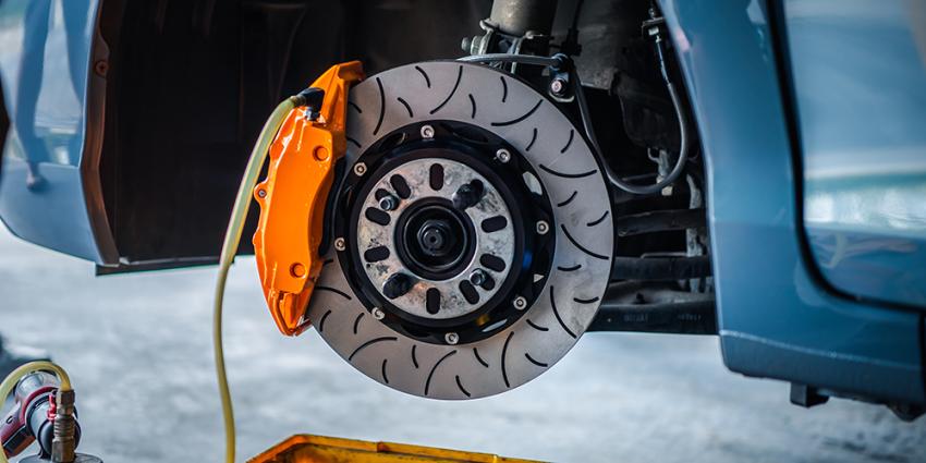 Car brakes being repaired at auto repair shop