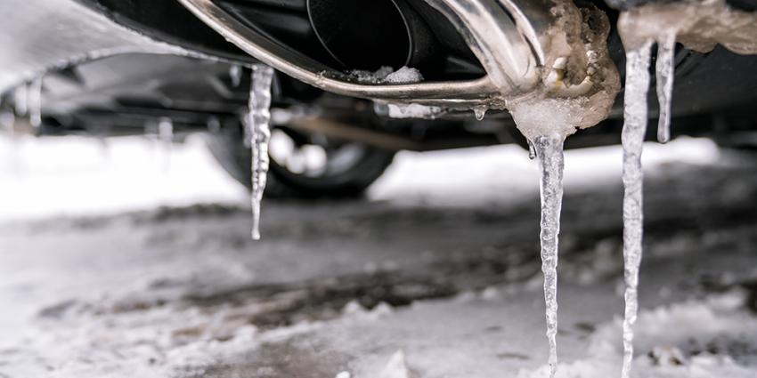 How long should I let my car warm up in winter? Ice drips from a muffler.