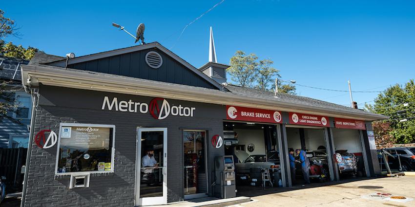 An exterior view of the Metro Motor auto repair shop in Clarendon, Virginia
