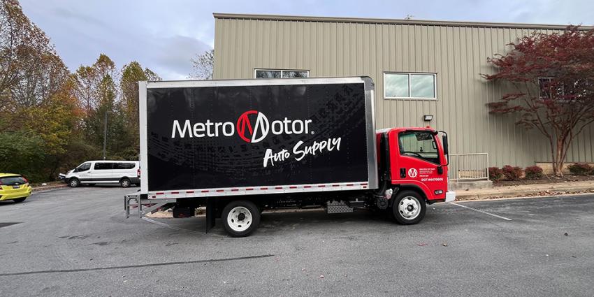 Metro Motor Auto Supply delivery truck parked outside of warehouse