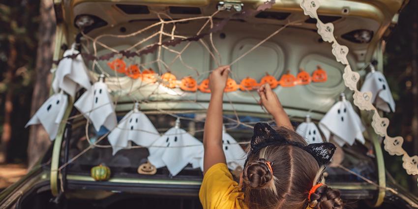 Girl Decorates Vehicle for Trunk or Treating on Halloween