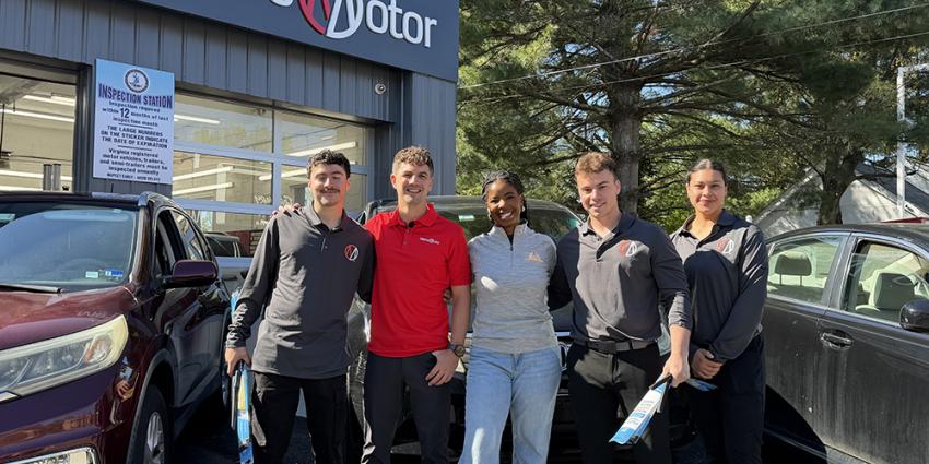 Metro Motor auto repair technicians stand in front of three vehicles to kick off Wiper Week 2026